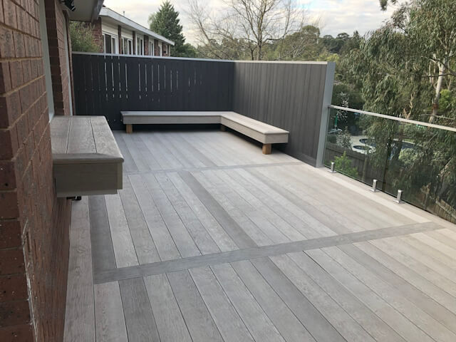 Low maintenance composite deck