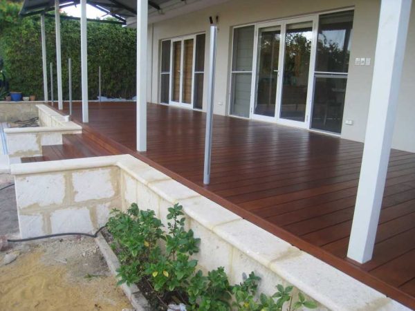 Front entry deck in Merbau timber with sandstone paving. Merbau Timber Deck Veranda