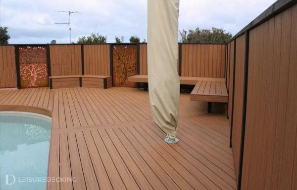 Composite pool deck built with Trex Island Mist with picture-frame border around pool. Trex Island Mist composite deck with picture-frame border around pool & built in bench seats. Ocean Grove VIC